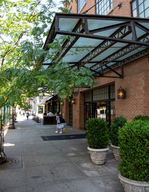 Frosted glass overhang on NYC sidewalk