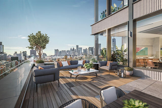 Two-story rooftop lounge area overlooking New York City skyline