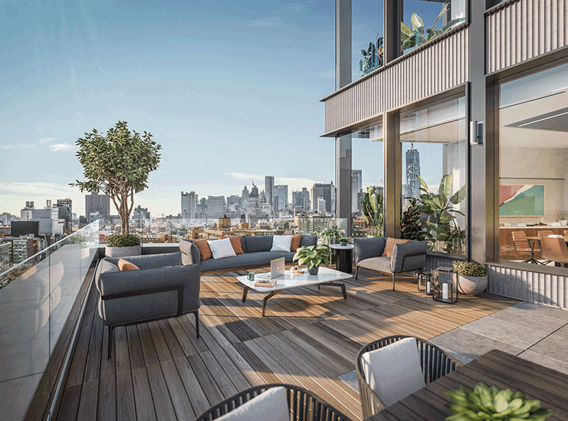 Two-story rooftop lounge area overlooking New York City skyline