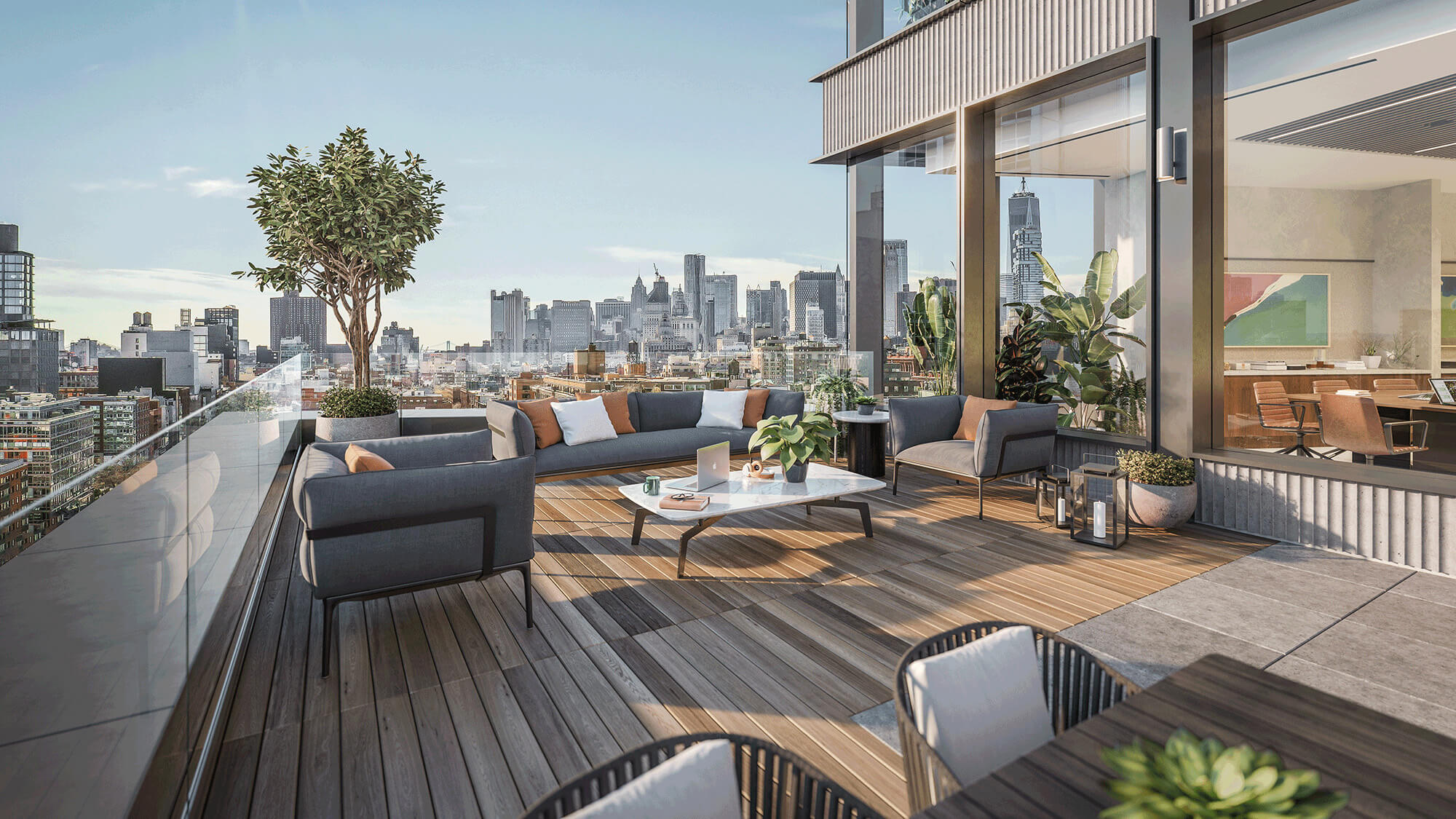 Two-story rooftop lounge area overlooking New York City skyline